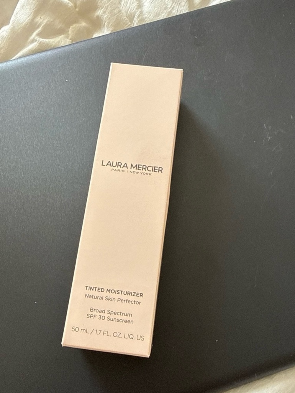 laura mercier Tinted Moisturizer Box in Pale Pink